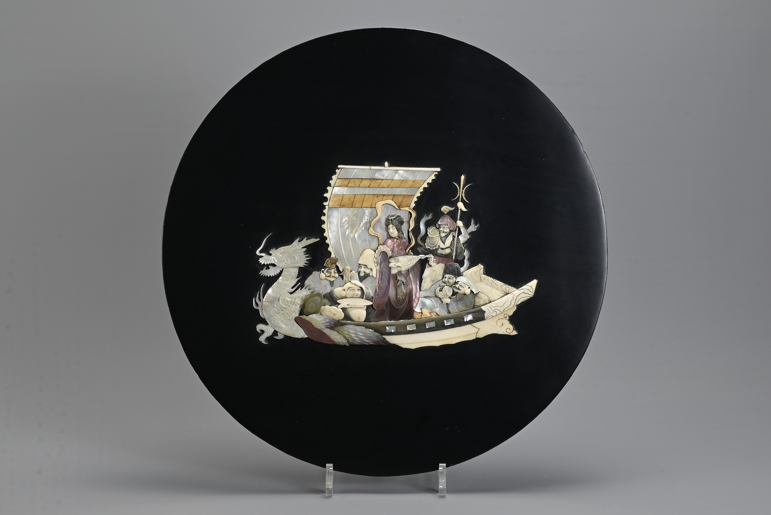 A JAPANESE MEIJI PERIOD (1868-1912) SHIBAYAMA PLAQUE OR COVER. Depicting Seven Lucky Gods on their