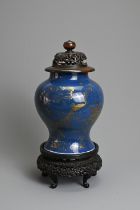 A CHINESE POWDER BLUE AND GILT DECORATED PORCELAIN VASE, 18/19TH CENTURY. The vase of baluster
