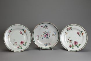 THREE CHINESE FAMILLE ROSE DISHES, 18TH CENTURY. To include a pair of dishes decorated with floral