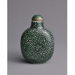 A CHINESE SHAGREEN IMITATION PORCELAIN SNUFF BOTTLE, QING DYNASTY. Of flattened globular form