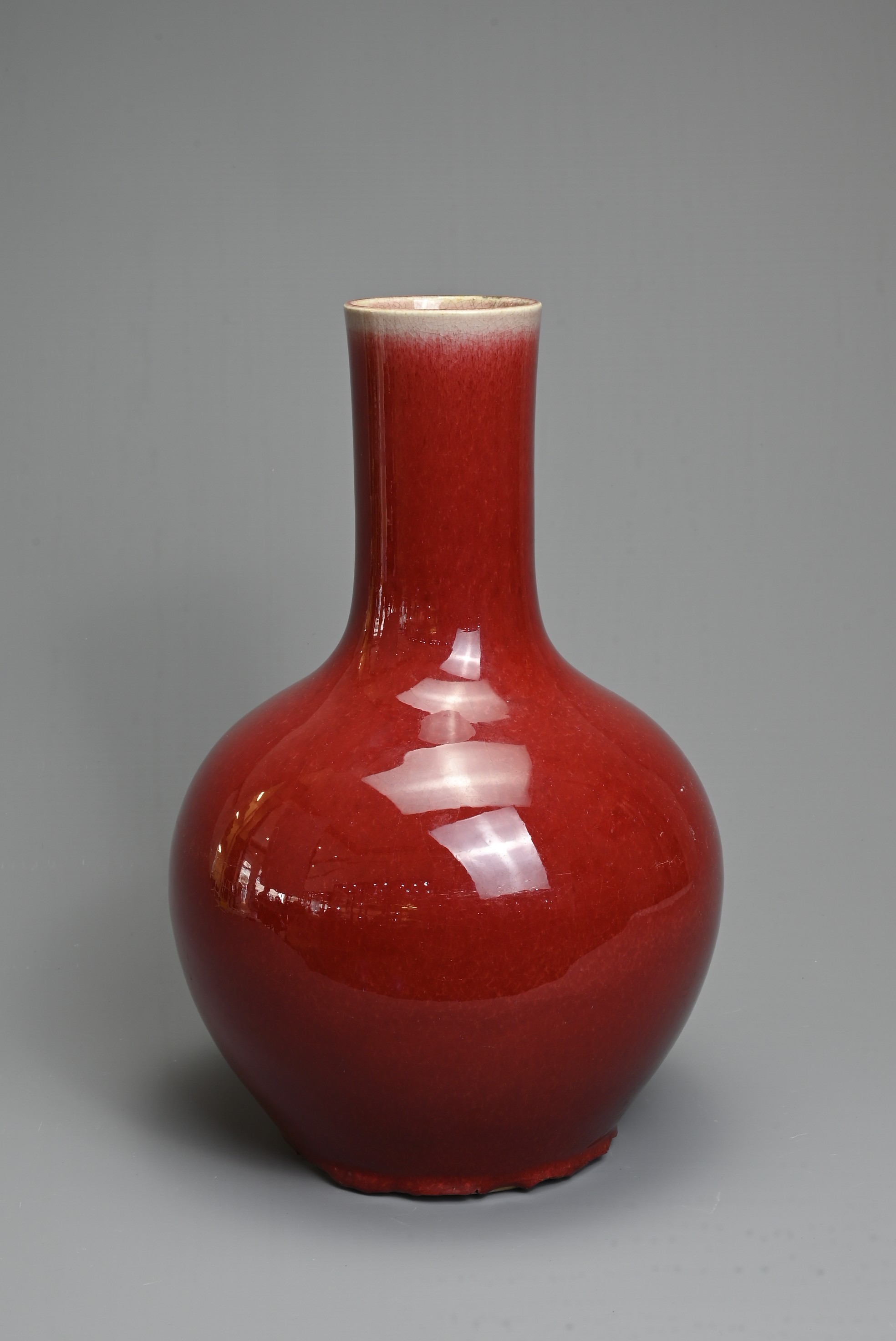 A CHINESE SANG DE BOEUF GLAZED PORCELAIN VASE, 19/20TH CENTURY. Globular bottle with tall - Image 3 of 6