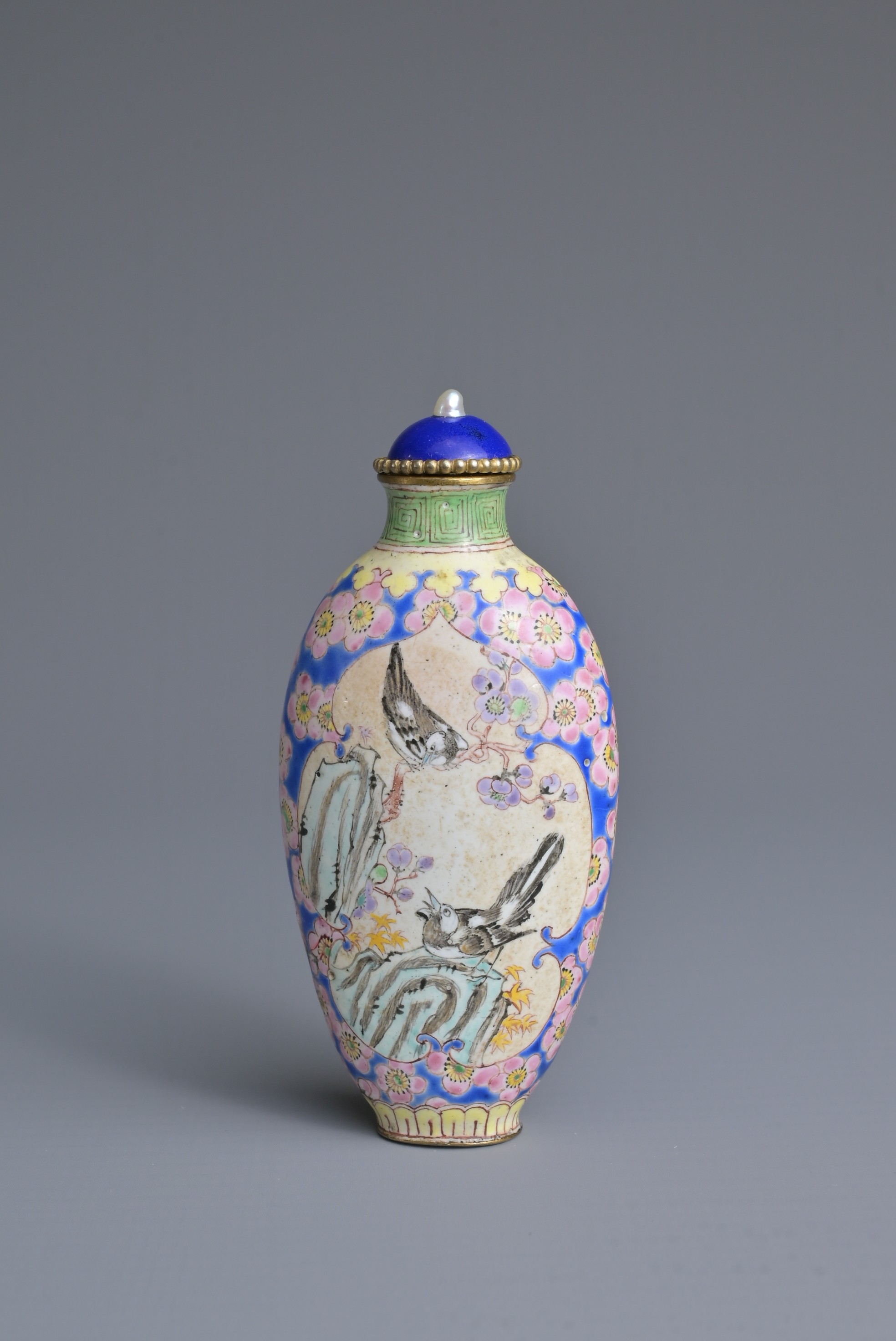 A CHINESE PAINTED ENAMEL SNUFF BOTTLE, QING DYNASTY. Tall ovoid form decorated with cartouche panels - Image 2 of 7