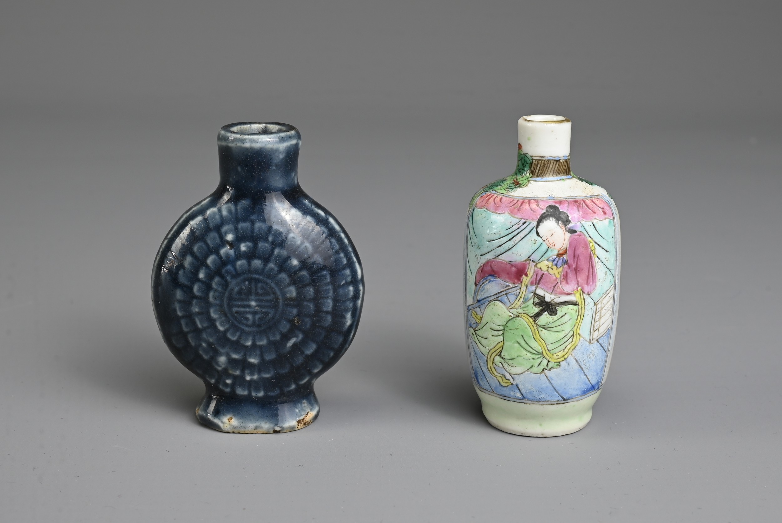 TWO CHINESE PORCELAIN SNUFF BOTTLES, LATE QING DYNASTY. To include an ovoid bottle with