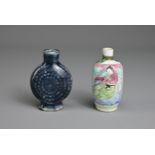 TWO CHINESE PORCELAIN SNUFF BOTTLES, LATE QING DYNASTY. To include an ovoid bottle with