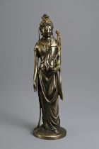 AN EARLY 20TH CENTURY JAPANESE BRONZE OF THE HOLY KANNON BY KOUN TAKAMURA (1852-1934). Kannon, the