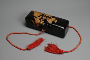 A 19TH CENTURY JAPANESE DOMED RECTANGULAR LACQUER LETTER BOX (FUBAKO). Decorated in gold maki-e on a