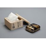 A CONTEMPORARY JAPANESE BLACK AND GOLD LACQUER INCENSE CASE BY SOTON NAKAMURA. Decorated with a