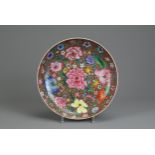 A CHINESE MILLEFLEUR DECORATED DISH, EARLY 20TH CENTURY. With rounded sides decorated to the