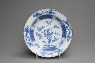 A CHINESE BLUE AND WHITE PORCELAIN BOWL, 18TH CENTURY. Shallow bowl with rounded sides and everted
