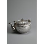A FINE CHINESE SILVER TEAPOT, NANKING BAO QING, CIRCA 1900. Of globular form with two faux bamboo