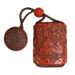 A JAPANESE MEIJI PERIOD (1868-1912) RED LACQUER INRO. With red lacquer manju netsuke and ojime