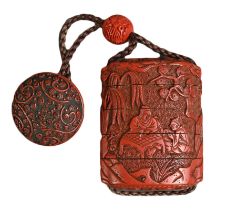 A JAPANESE MEIJI PERIOD (1868-1912) RED LACQUER INRO. With red lacquer manju netsuke and ojime