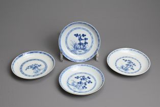 FOUR CHINESE BLUE AND WHITE PORCELAIN SAUCERS, 18TH CENTURY. Each finely potted, decorated with pine