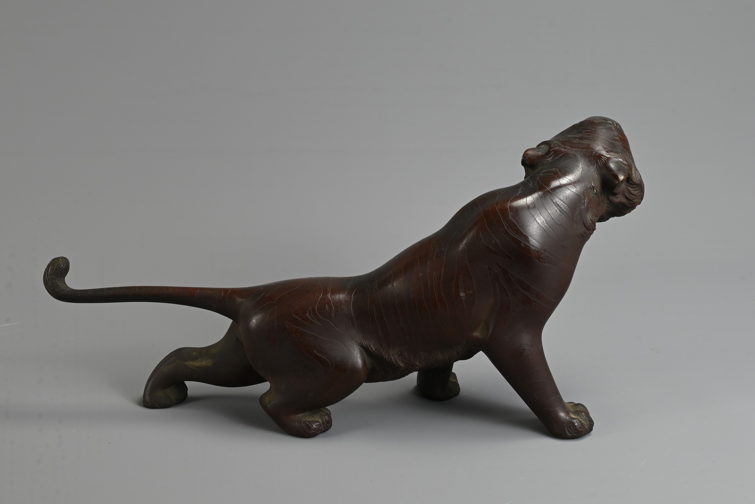 A LATE 19TH/EARLY 20TH CENTURY JAPANESE BRONZE OKIMONO OF A TIGER BY NOBUMITSU. Naturalistically - Image 5 of 7