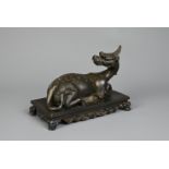 A CHINESE BRONZE MODEL OF A MYTHICAL BEAST, QILIN, QIANLONG MARK, QING DYNASTY