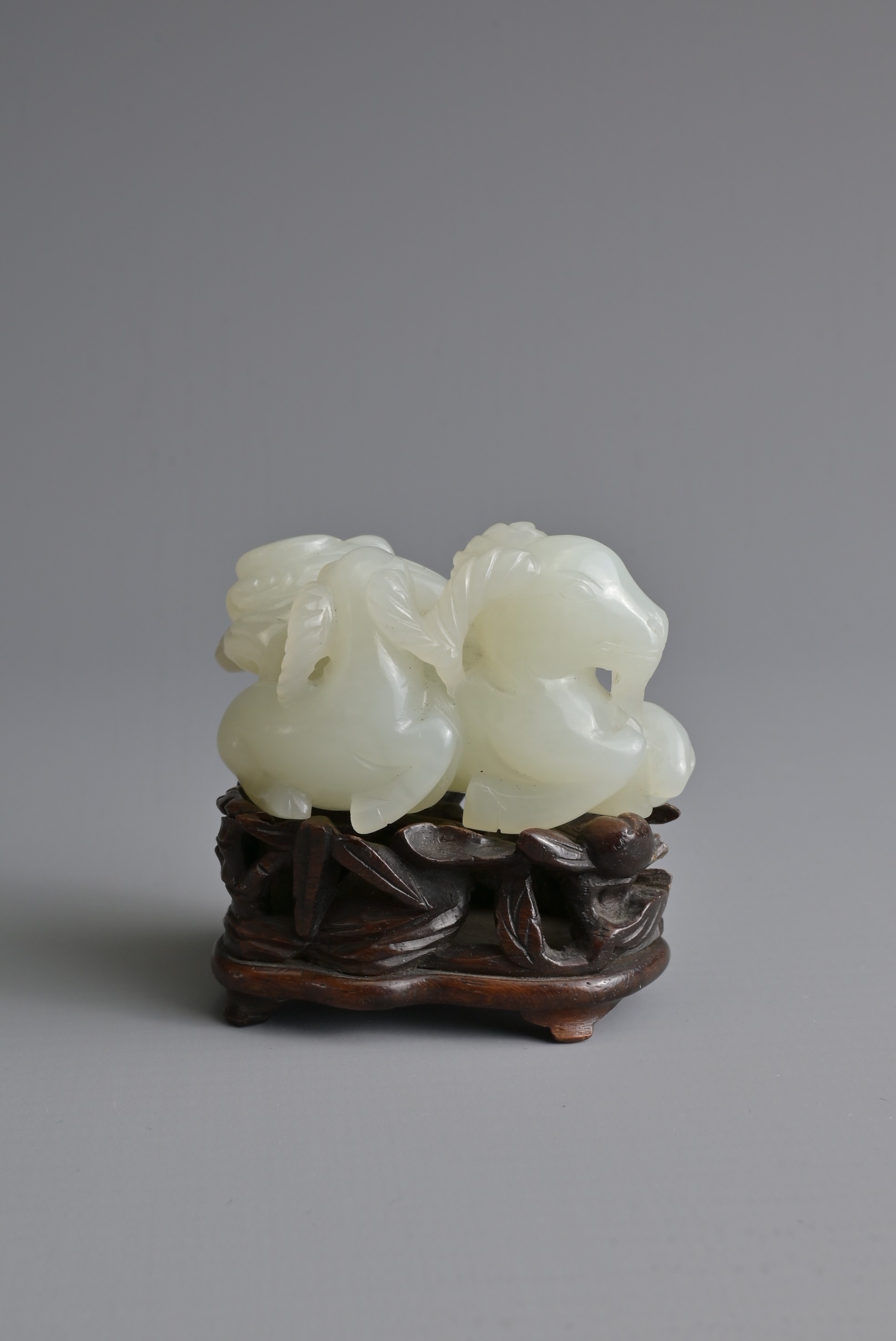 A CHINESE WHITE JADE DEER GROUP ON WOODEN STAND, 19/20TH CENTURY. Carved and pierced in the form - Image 5 of 8