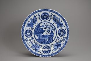 A LARGE CHINESE BLUE AND WHITE PORCELAIN DISH, 18TH CENTURY. The interior roundel depicting a boy on