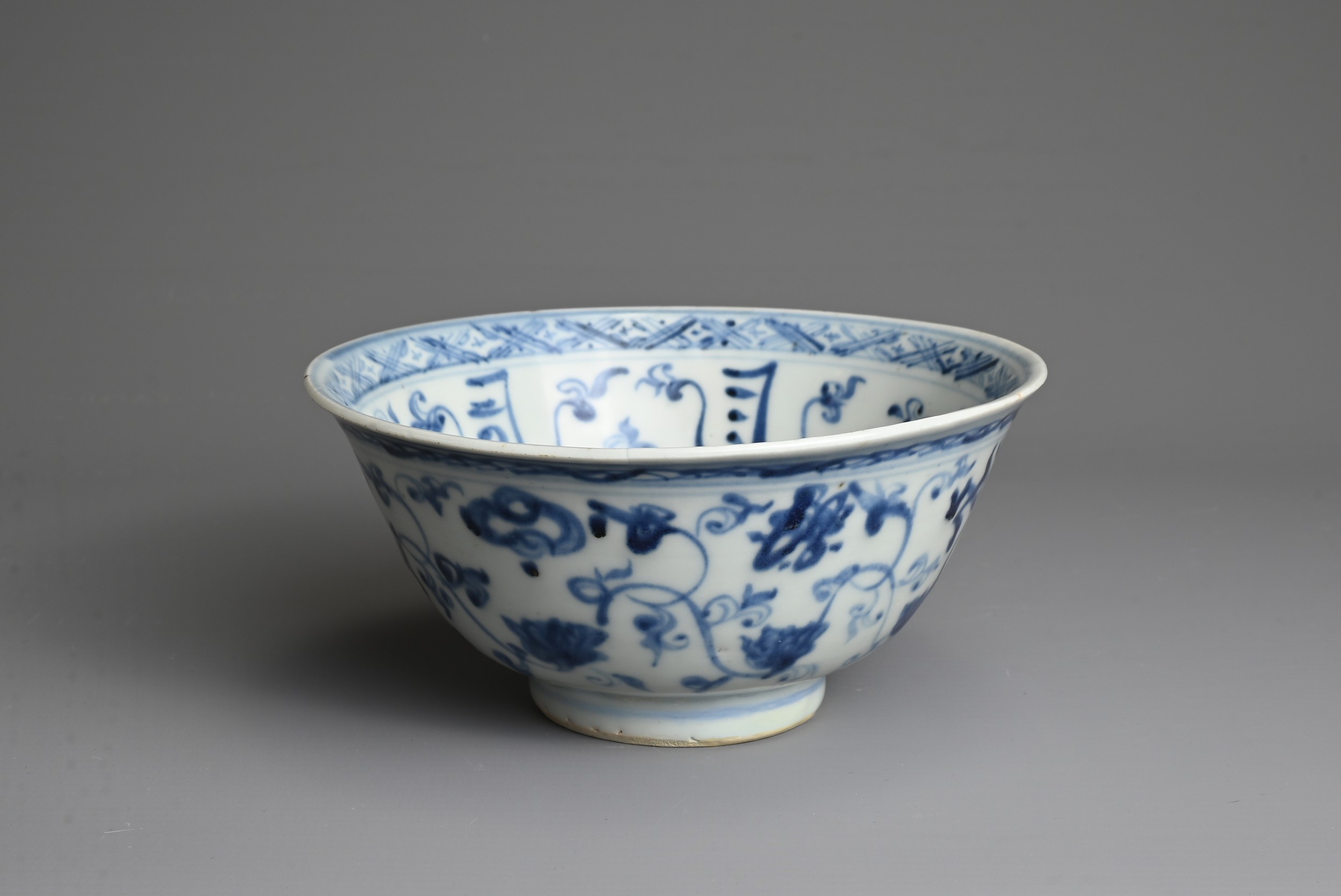 A CHINESE BLUE AND WHITE PORCELAIN BOWL, MING DYNASTY. Decorated with lotus scrolls and Buddhist - Image 3 of 7