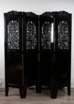AN EBONISED FOUR PANEL SCREEN, LATE 20TH CENTURY. With pierced leafy scroll sections to the top half