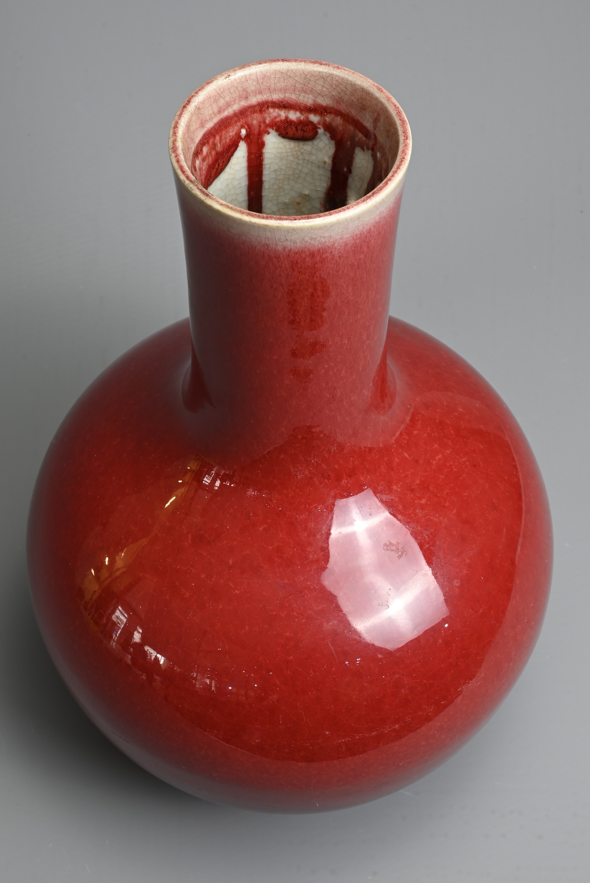 A CHINESE SANG DE BOEUF GLAZED PORCELAIN VASE, 19/20TH CENTURY. Globular bottle with tall - Image 6 of 6