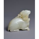 A CHINESE WHITE JADE CARVING OF A DEER, QING DYNASTY. Carved and pierced in the form of a