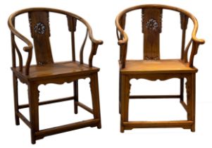 A PAIR OF CHINESE HUANGHUALI HORSESHOE BACK ARMCHAIRS, QUANYI. Each with a curved top rail in five