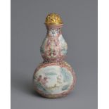 A CHINESE FAMILLE ROSE PORCELAIN SNUFF BOTTLE, 19TH CENTURY. In the form of a double gourd painted