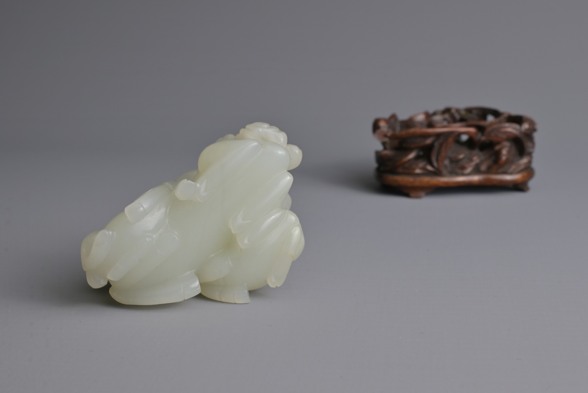 A CHINESE WHITE JADE DEER GROUP ON WOODEN STAND, 19/20TH CENTURY. Carved and pierced in the form - Image 7 of 8