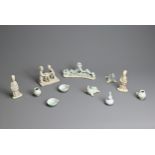 A GROUP OF CHINESE QINGBAI WARE AND BISCUIT PORCELAIN ITEMS. To include a pair of glazed joss