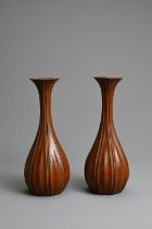 A PAIR OF JAPANESE LACQUERED BOXWOOD VASES, EARLY 20TH CENTURY. Each carved with tall lobed