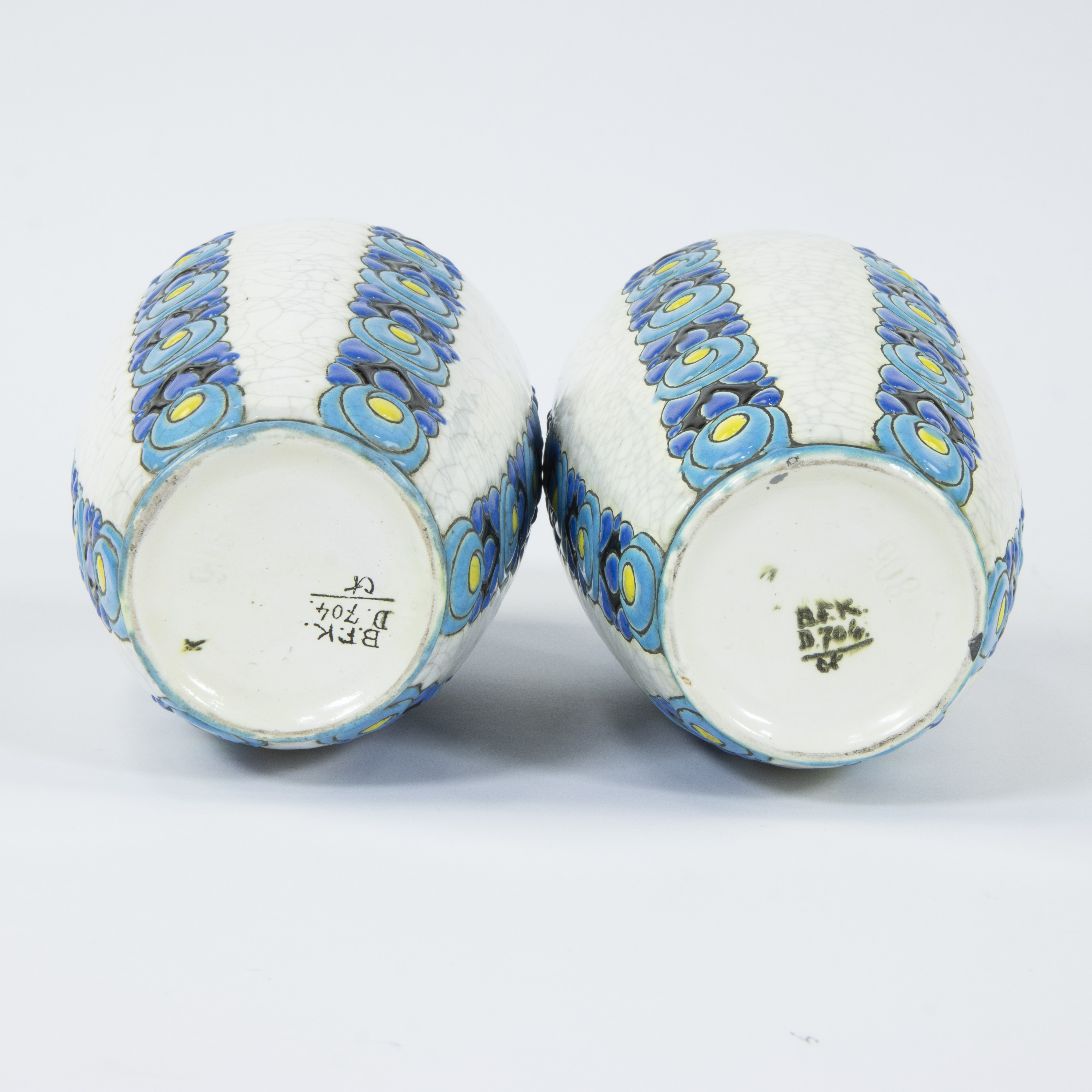 A pair of Boch Keramis Art Deco vases with polychrome floral 'Rosette' decor and crackle glaze, D704 - Image 5 of 5