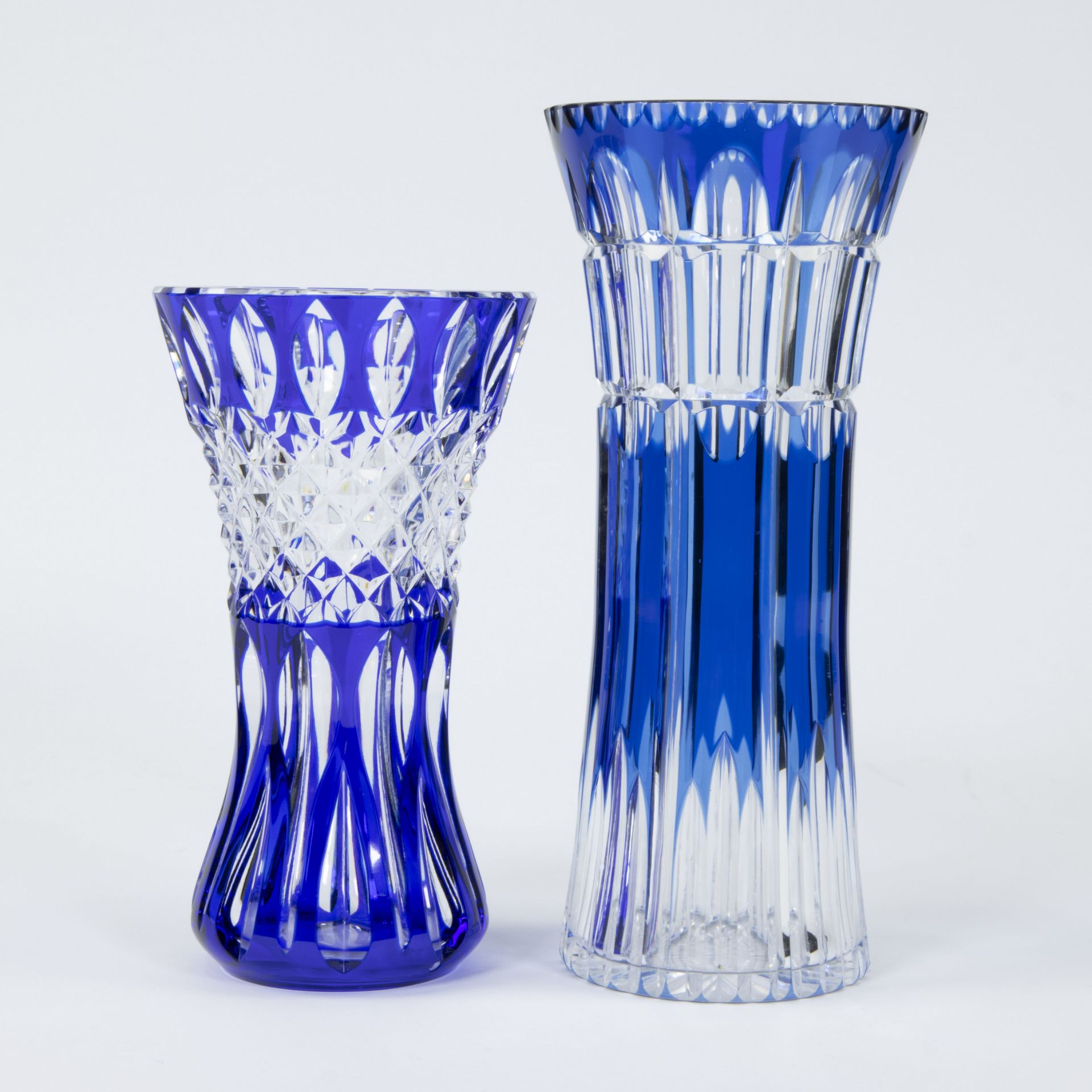 Val Saint Lambert 2 clear and blue cut crystal vases, one signed