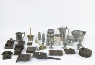 Large lot of tin, iron locks, mortar with pestle