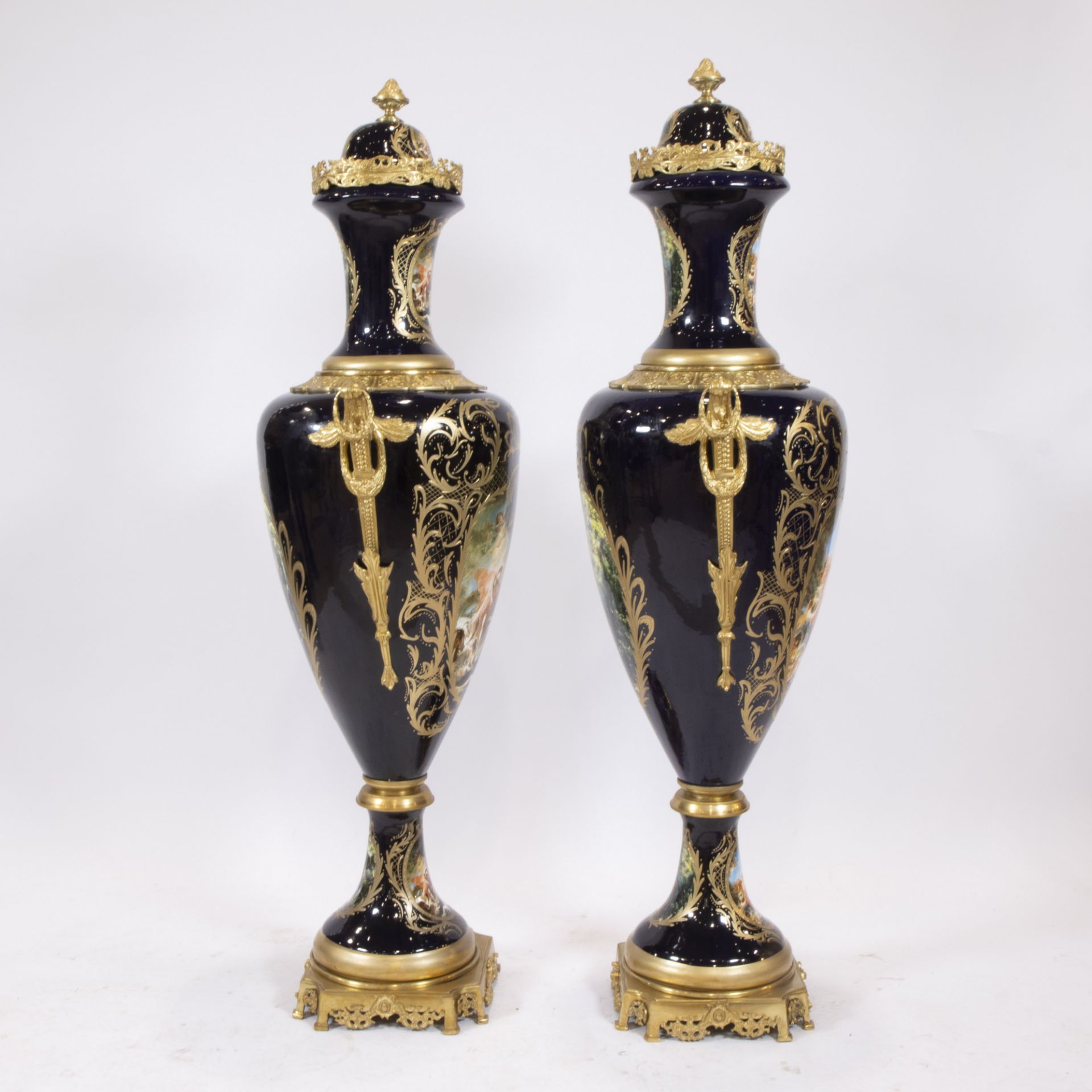 A pair of exceptionally tall ornamental vases of cobalt blue porcelain and gilt brass, decorated wit - Image 4 of 4