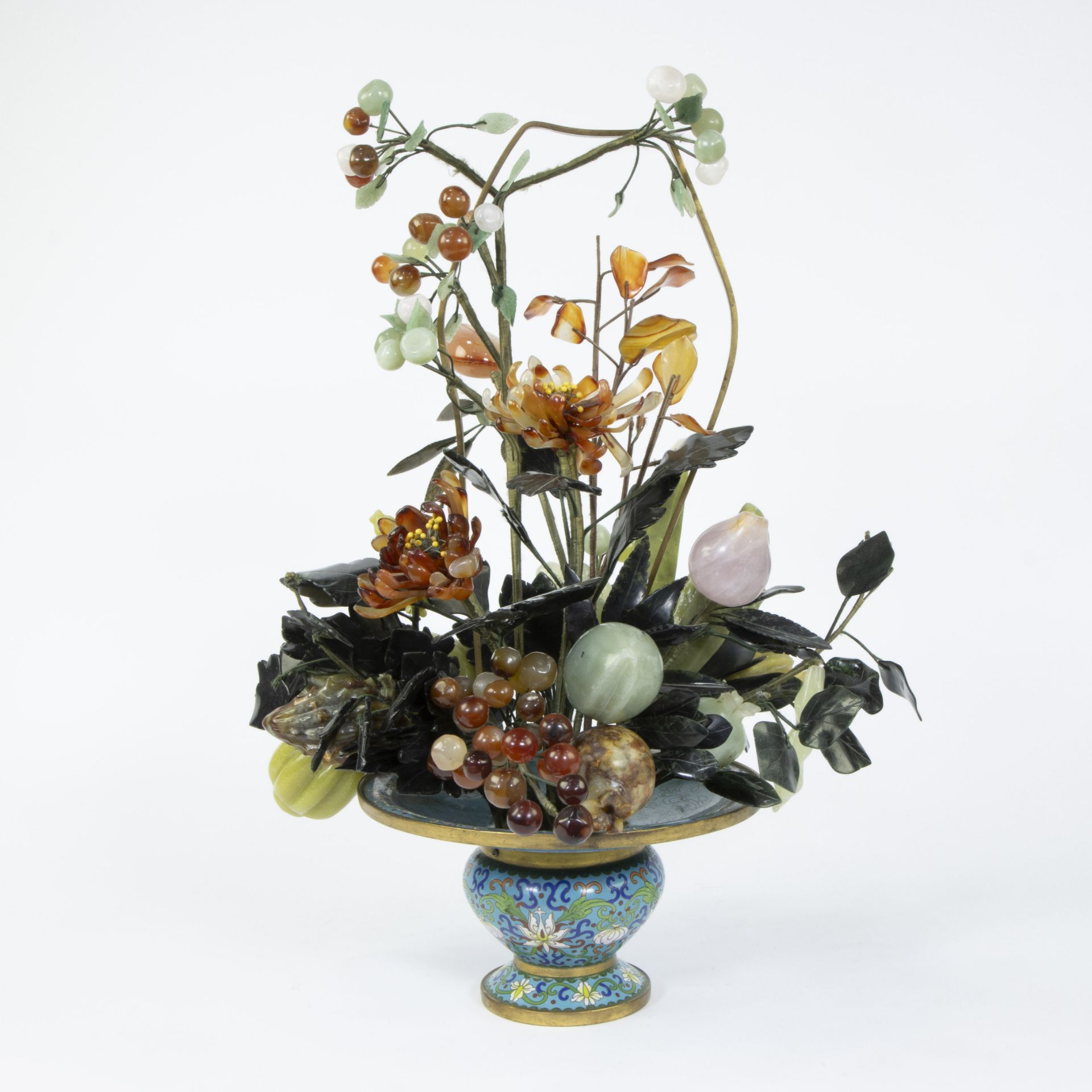 Gilt bronze Chinese cloisonne pot with a floral arrangement of hand-carved quartz glass, carnelian,