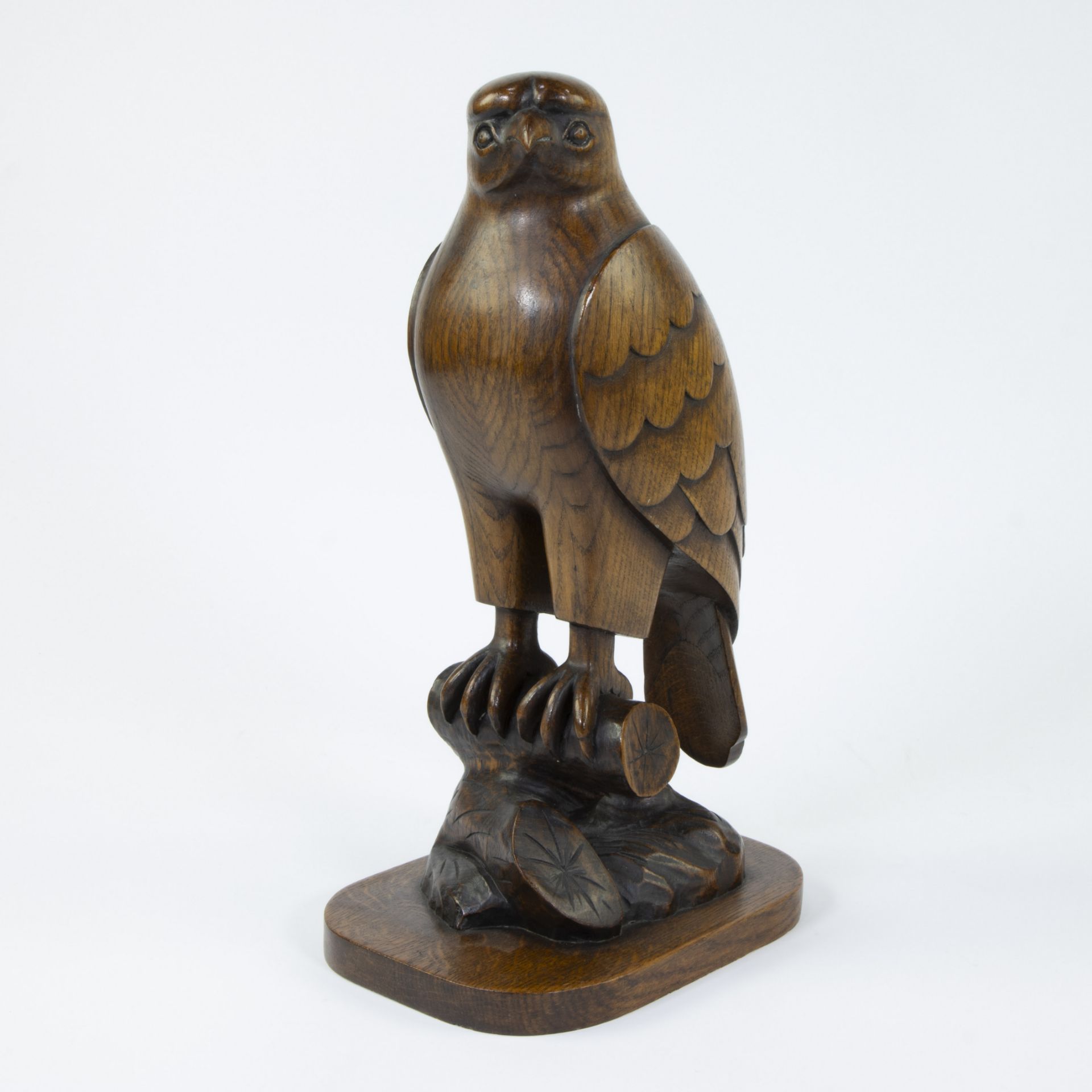 Large wooden eagle, signed G Malfait