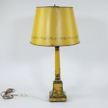 Mid-century yellow and black transfer-tole lamp, column and base decorated with English figural land