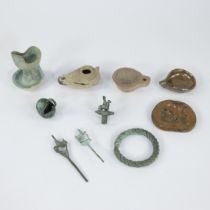 Collection of oil lamps, ring and bronze soil finds