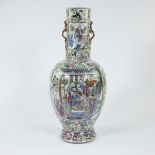 A large Chinese famille rose vase, decorated with flowers, birds, butterflies and dragons , the pane