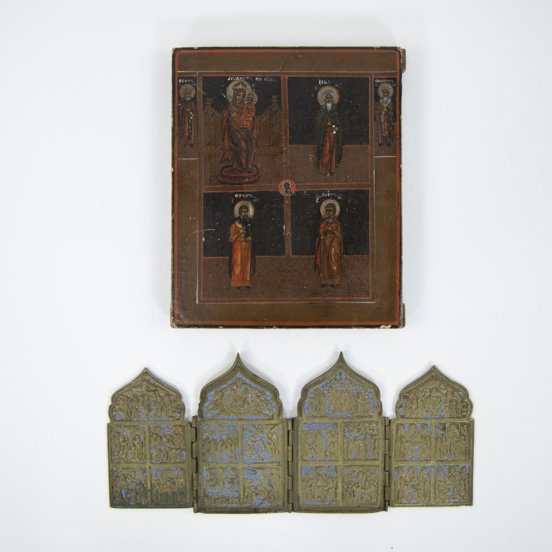 A bronze travel icon and 19th century Russian icon