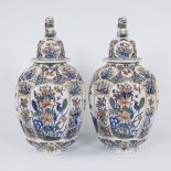 A pair of large hand-painted cashmere lidded vases in Delft style, France, 19th century