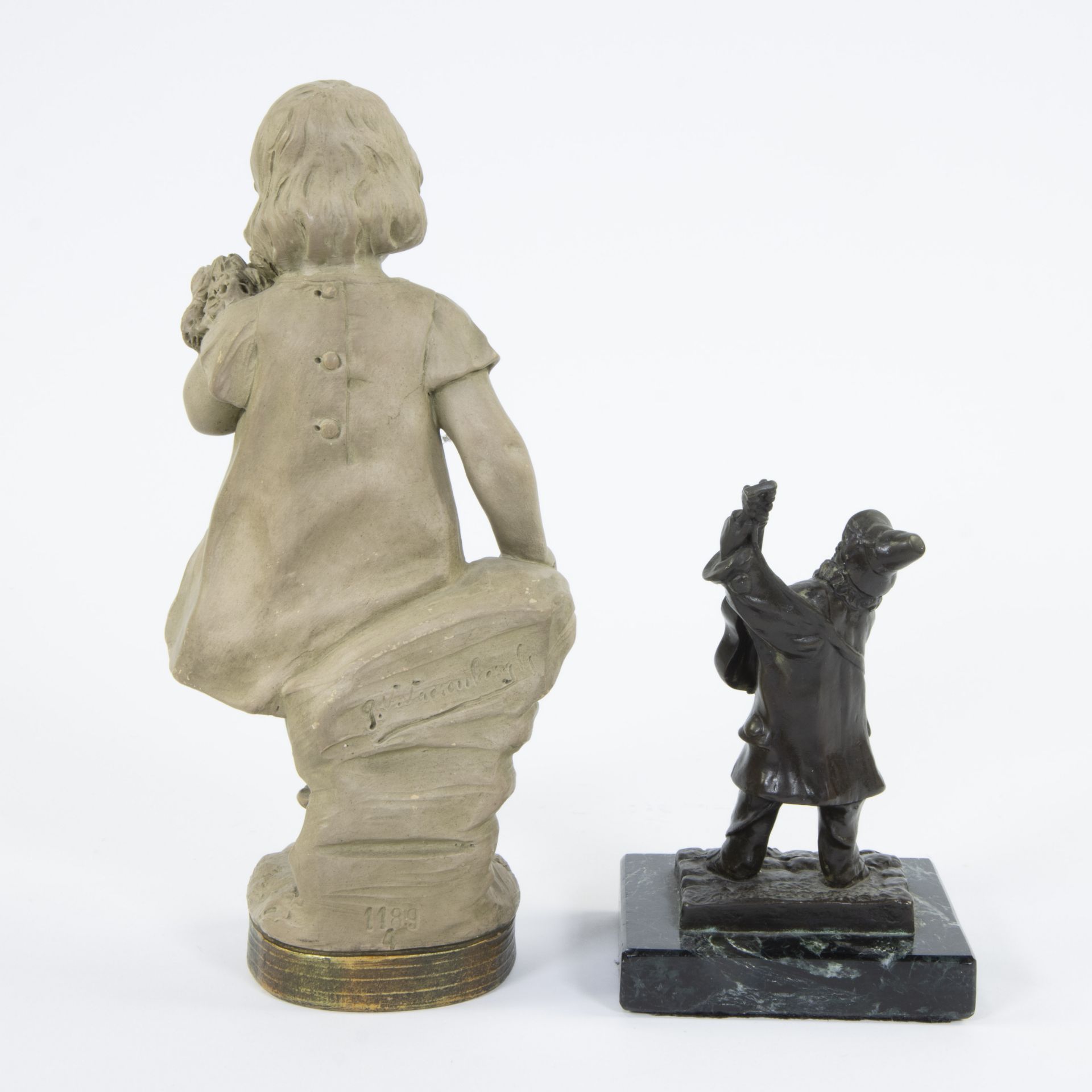 Collection of a bronze in black patina The musician, signed Rousseau and a terracotta figurine Flowe - Image 3 of 6