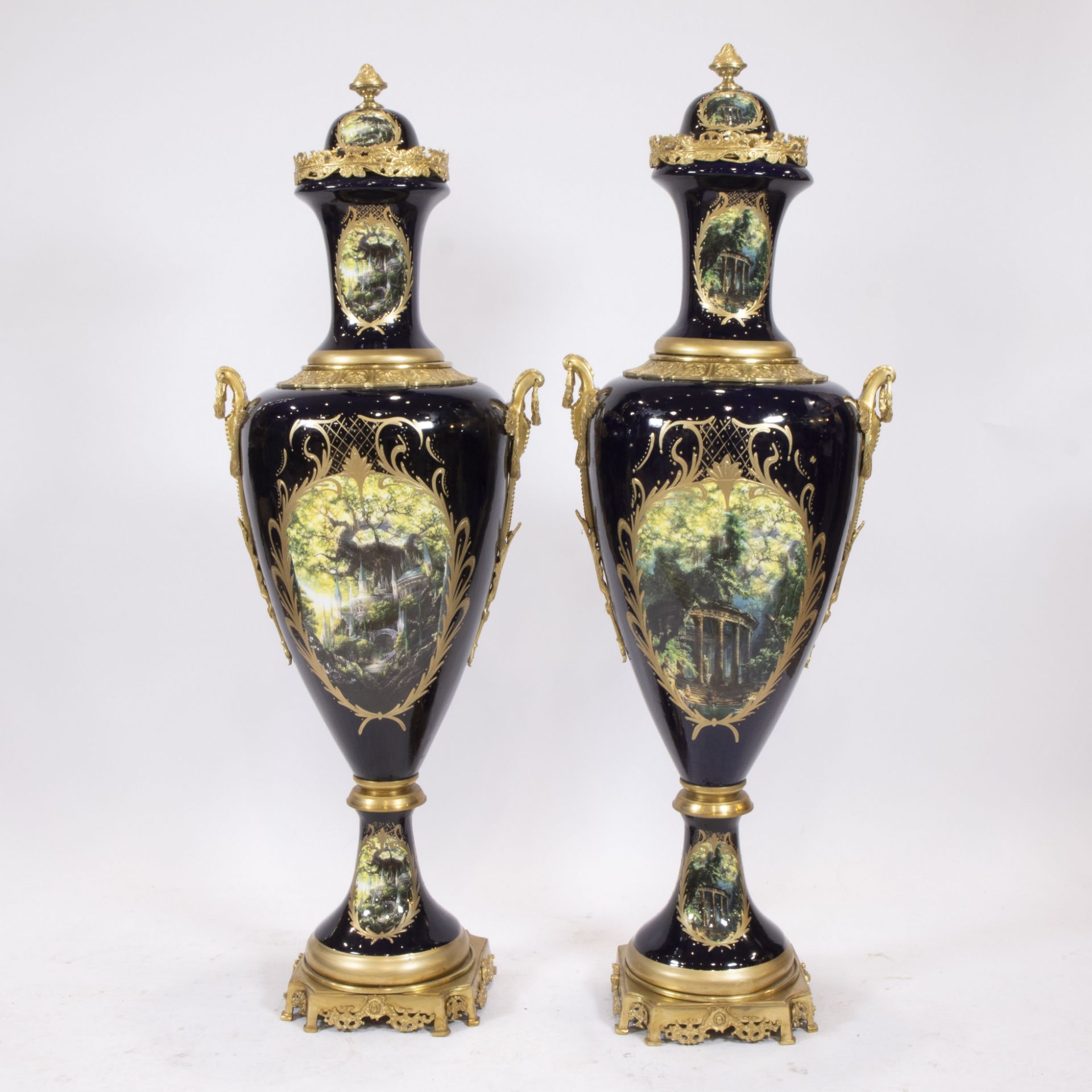 A pair of exceptionally tall ornamental vases of cobalt blue porcelain and gilt brass, decorated wit - Image 3 of 4