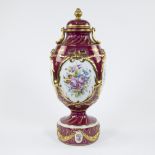 French porcelain lidded vase with gilt garlands and medallions with hand-painted floral decoration,