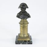 Brown patinated bust of Napoleon on gilded bronze column column opmarble base, 19th century