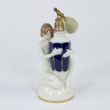 A Royal Dux art deco fine porcelain perfume bottle depicting a nude woman holding a faceted vase dec