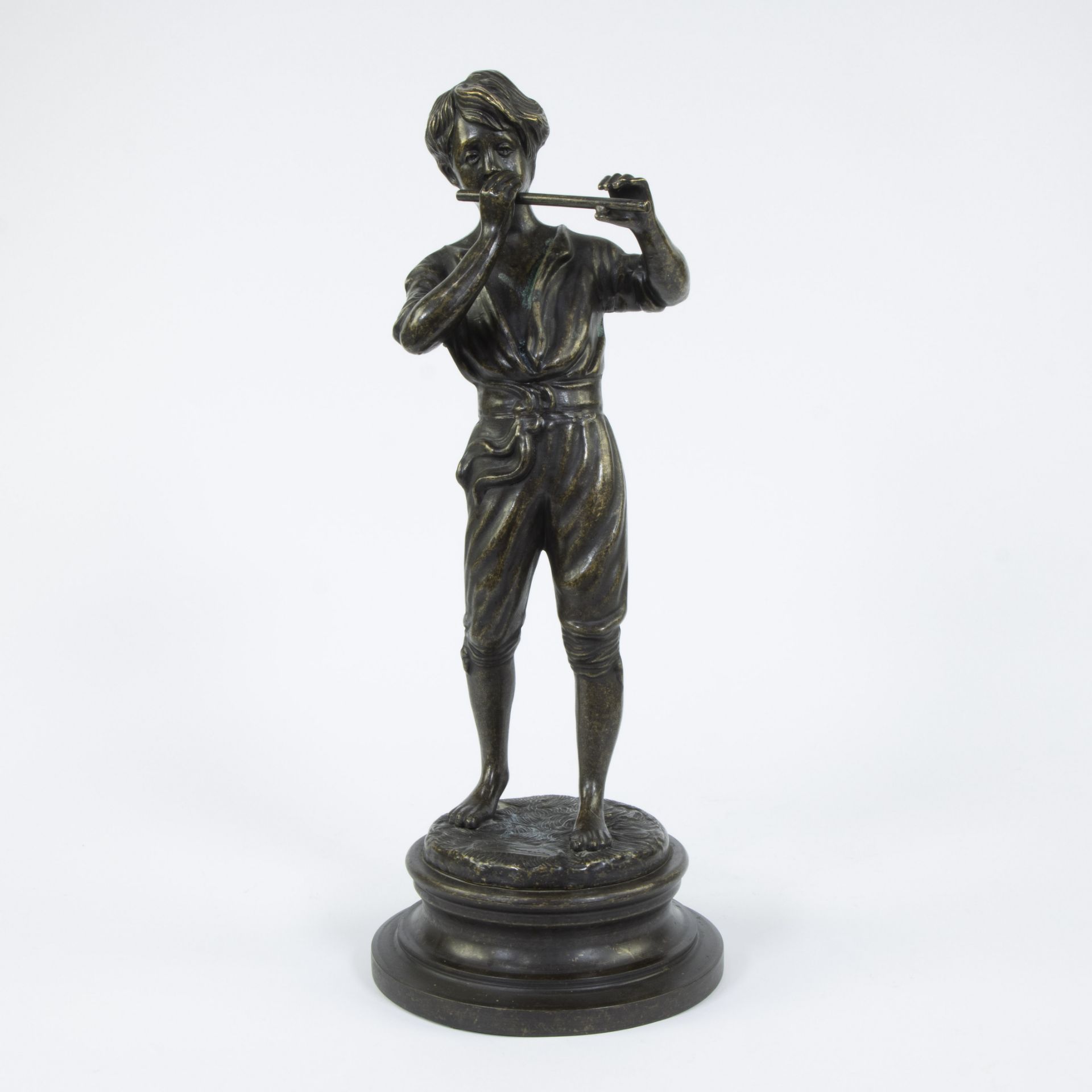 Bronze sculpture of a young flute player, signed, Fonderia Lancini