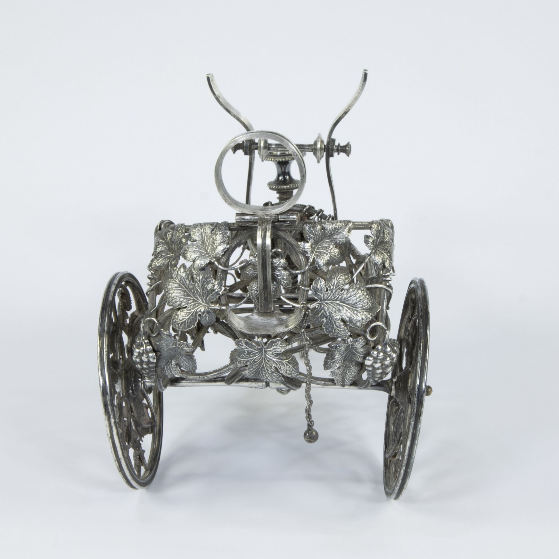 A French large silver-plated bottle chariot on three wheels, decorated with vines and grapes - Image 3 of 6