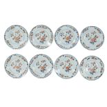 A set of 8 Imari porcelain dinner plates, decorated with peony, scattered flowers and Buddha hand ci