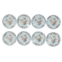 A set of 8 Imari porcelain dinner plates, decorated with peony, scattered flowers and Buddha hand ci